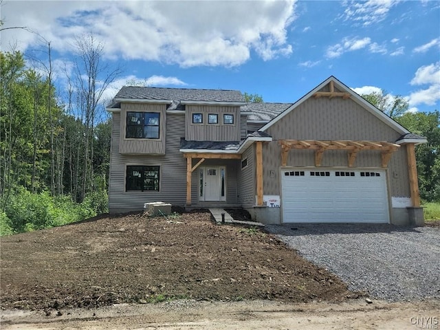 view of front of property featuring a garage