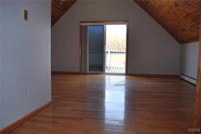 bonus room featuring a baseboard radiator, vaulted ceiling, wood ceiling, and hardwood / wood-style flooring