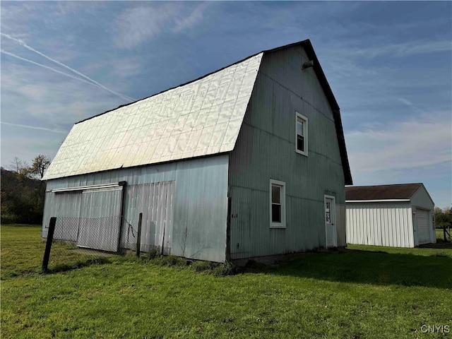 view of outdoor structure featuring a yard