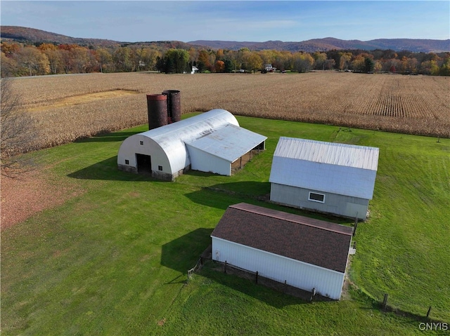 bird's eye view with a mountain view and a rural view