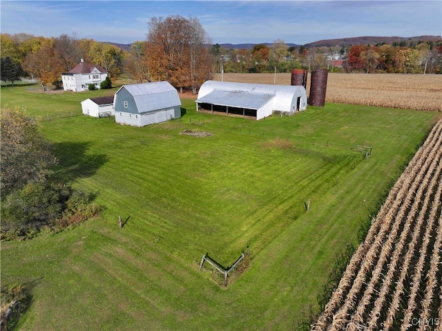 birds eye view of property featuring a rural view