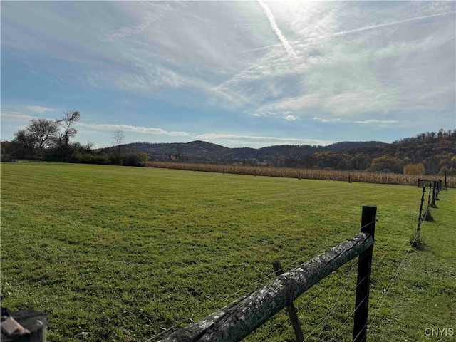 view of mountain feature with a rural view