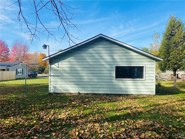 view of property exterior featuring a yard