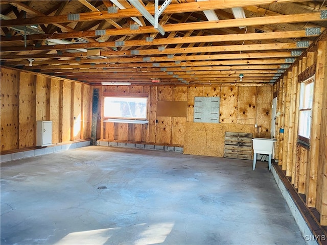 misc room featuring concrete flooring and sink