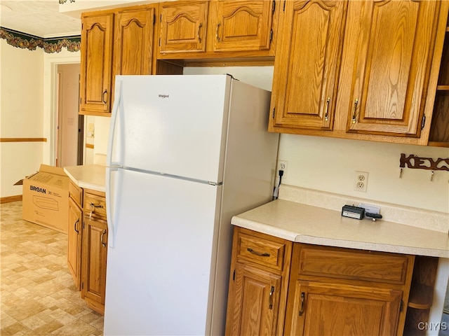 kitchen featuring white refrigerator