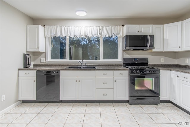 kitchen featuring light tile patterned floors, black appliances, sink, and white cabinets