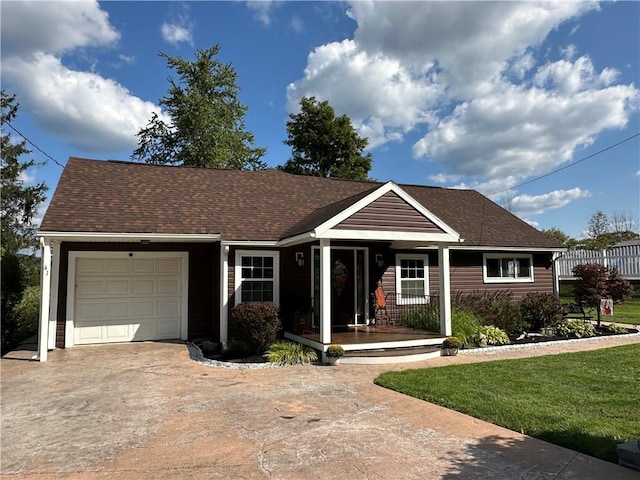 ranch-style house with a front yard, a porch, and a garage