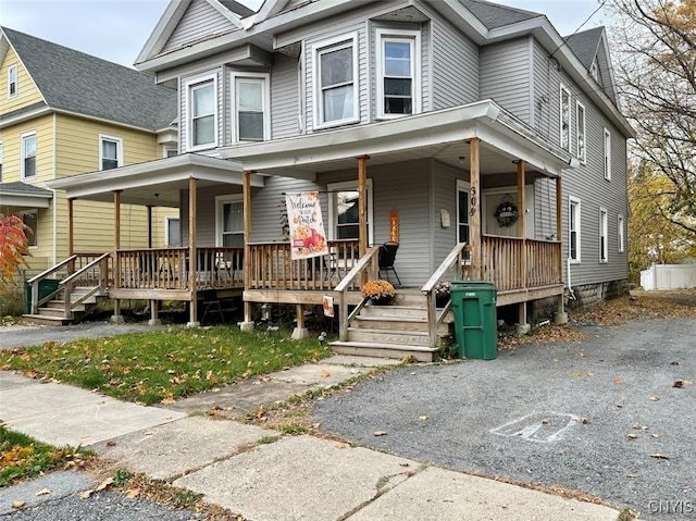 view of property with a porch