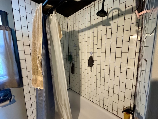 bathroom with shower / bathtub combination with curtain