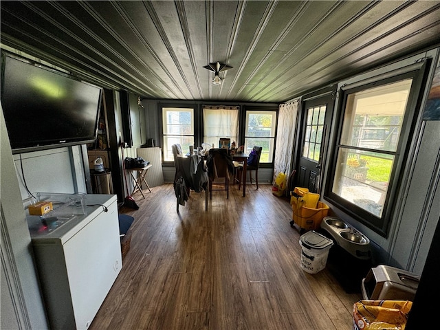 sunroom / solarium with wood ceiling