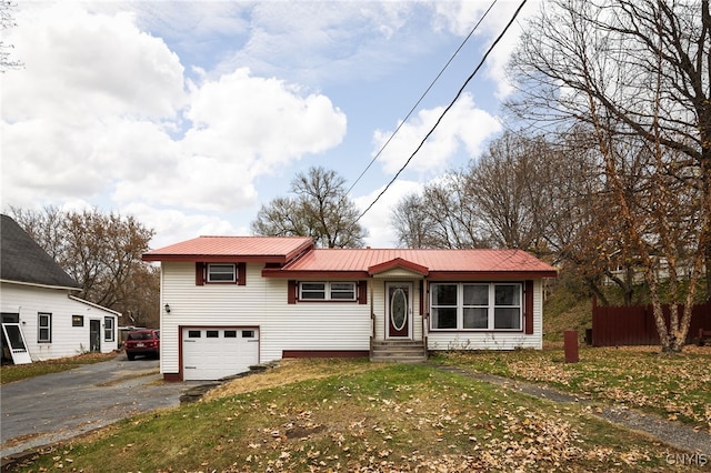 view of front of property with a garage