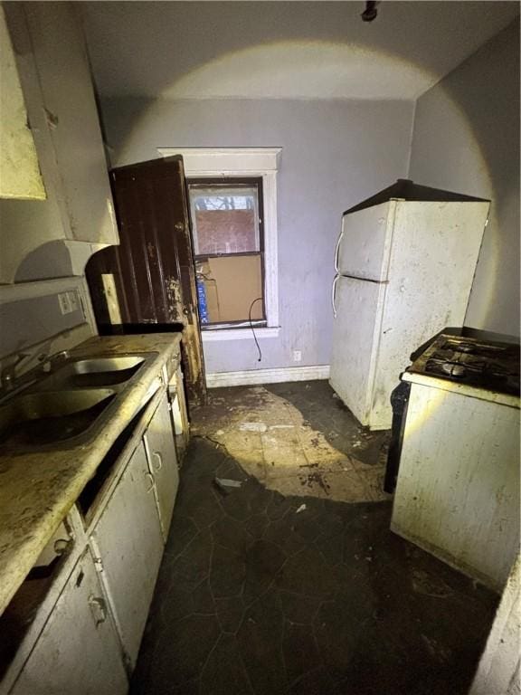 32 Laforce St, Rochester, NY 14621 - kitchen with a sink and baseboards