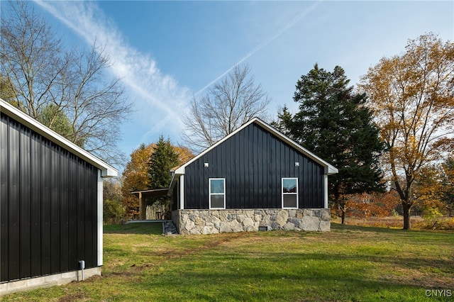 view of property exterior featuring a yard