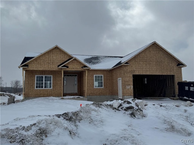 property under construction with an attached garage