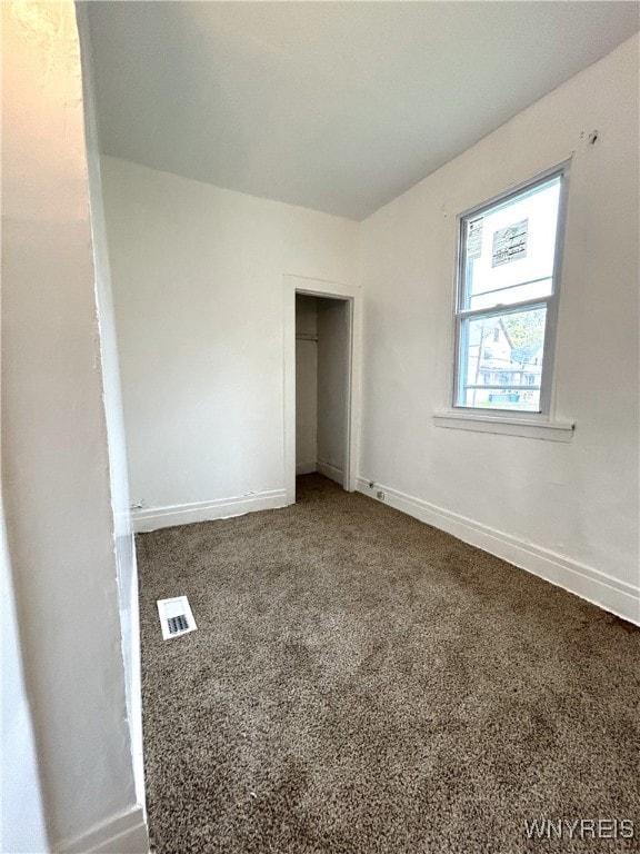 unfurnished bedroom with carpet