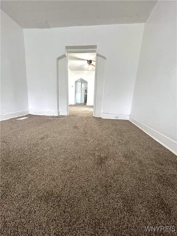 carpeted empty room with ceiling fan