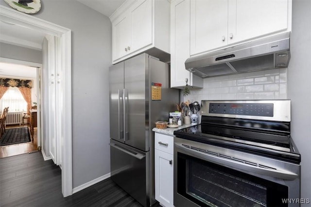 kitchen with stainless steel appliances, white cabinetry, tasteful backsplash, under cabinet range hood, and dark wood-style floors