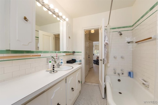 bathroom featuring vanity, shower / tub combo, decorative backsplash, and tile patterned flooring