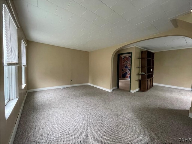 empty room with carpet flooring