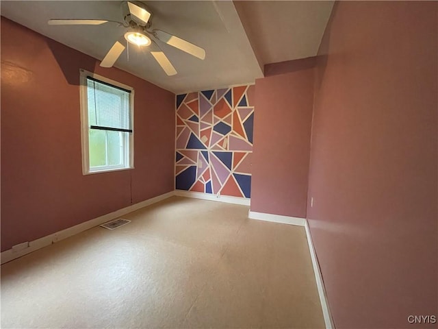 spare room featuring ceiling fan