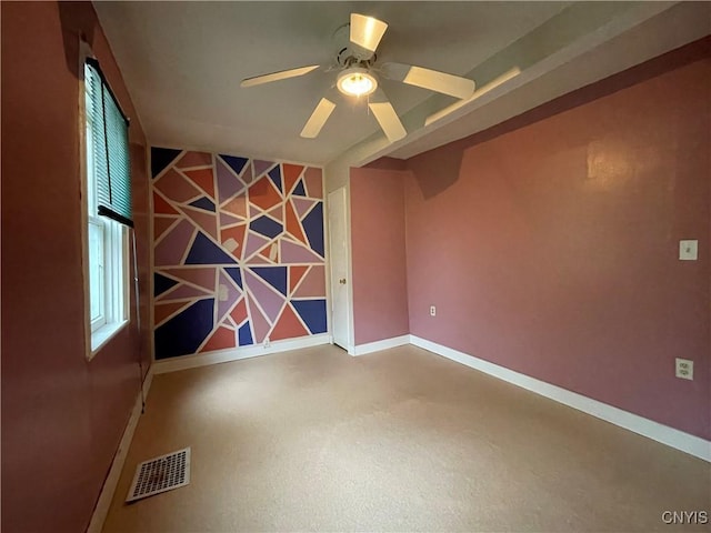 unfurnished room featuring ceiling fan