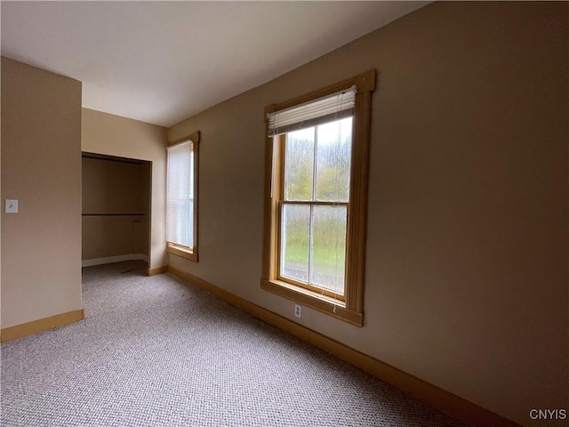 unfurnished bedroom featuring carpet