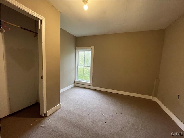 unfurnished bedroom featuring carpet flooring