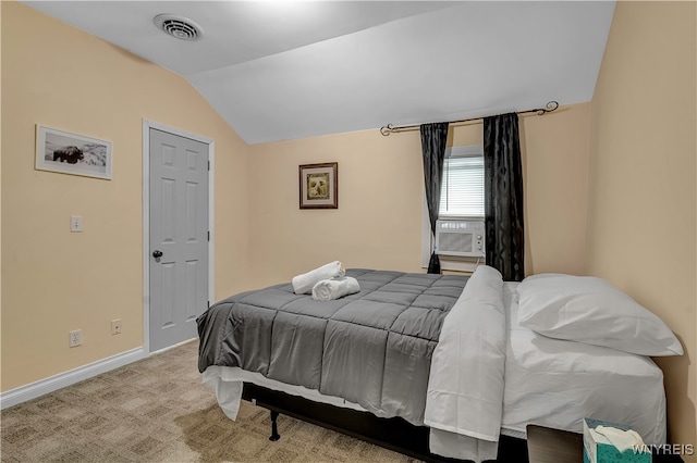 carpeted bedroom with lofted ceiling and cooling unit