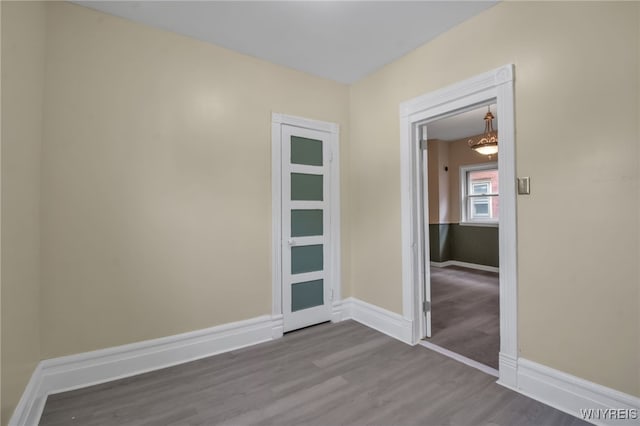 unfurnished room featuring hardwood / wood-style floors