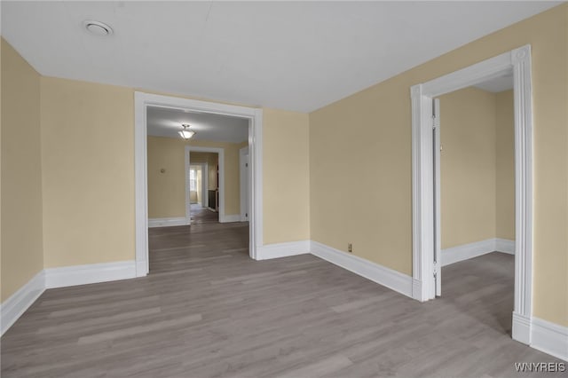 empty room with light wood-type flooring