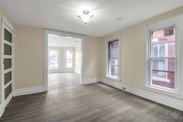 spare room featuring hardwood / wood-style flooring