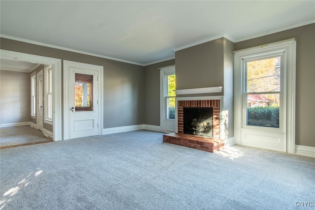 unfurnished living room featuring carpet and a brick fireplace