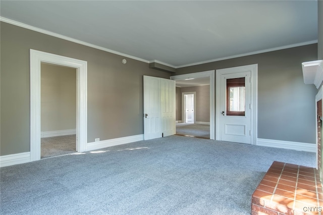 unfurnished living room with carpet flooring and ornamental molding