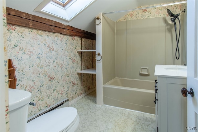 full bathroom with toilet, shower / bathing tub combination, vanity, and a skylight