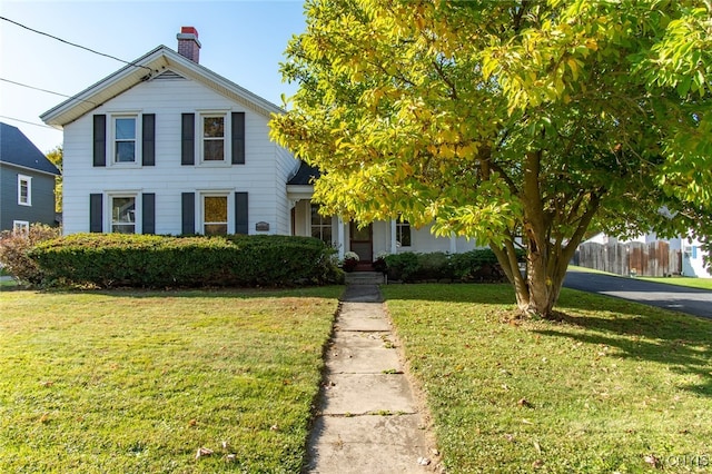 view of front of home with a front yard