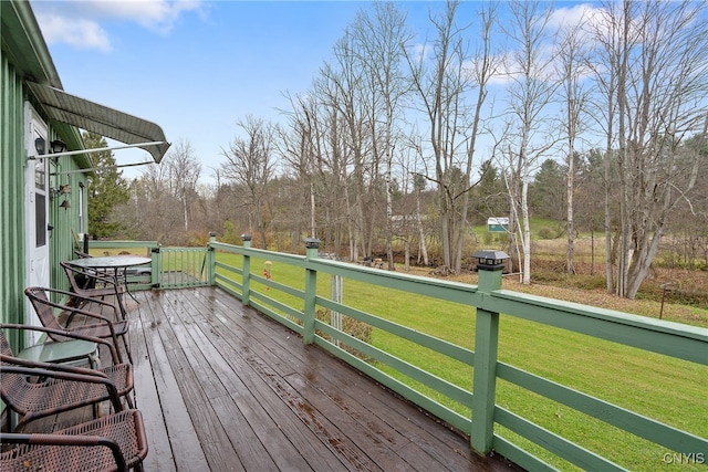 deck featuring a yard