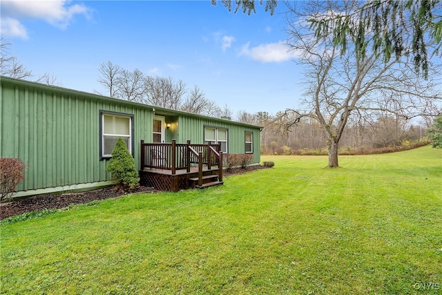 view of yard featuring a deck