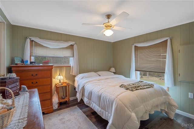 bedroom with ceiling fan and wood-type flooring