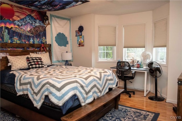 bedroom featuring hardwood / wood-style flooring