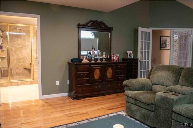 living area with hardwood / wood-style flooring