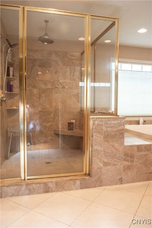 bathroom featuring tile patterned flooring and walk in shower