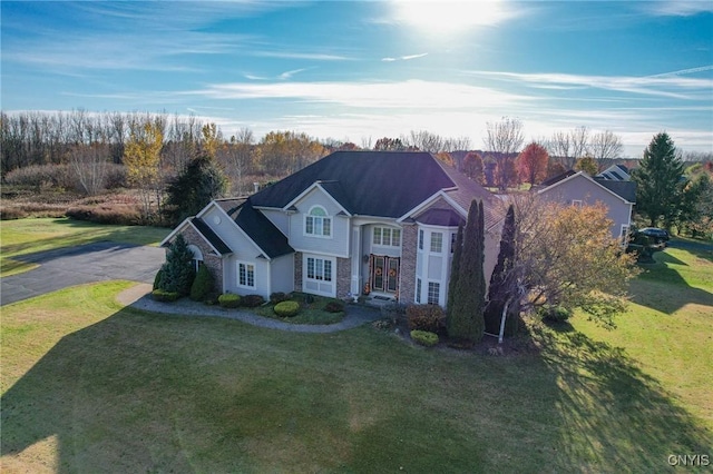 view of front of property with a front lawn