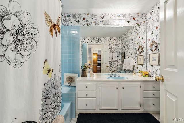 bathroom featuring vanity, shower / tub combo, and tile patterned flooring