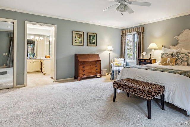 carpeted bedroom with ornamental molding, ensuite bathroom, and ceiling fan