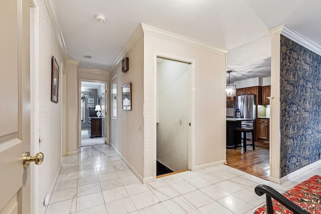 hallway with crown molding and light wood-type flooring