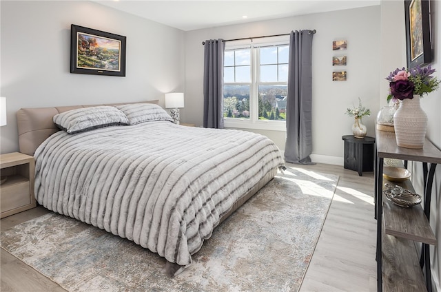 bedroom featuring light wood-type flooring