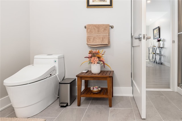 bathroom with tile patterned floors