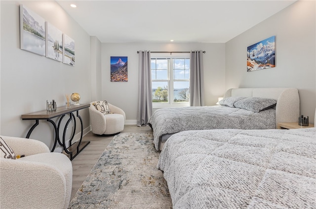 bedroom featuring light wood-type flooring