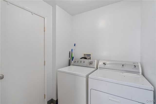 washroom featuring separate washer and dryer