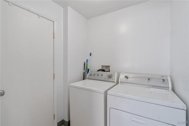 26 W 2nd St, Oswego-City, NY 13126 - laundry area featuring washing machine and dryer